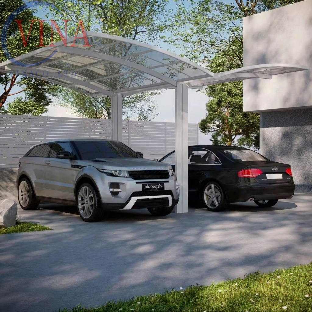 Mẫu nhà xe mái vòm khung nhôm kết hợp tấm lợp lấy sáng poly, đang che chắn cho xe Range Rover Evoque và Audi sedan trong sân vườn hiện đại.